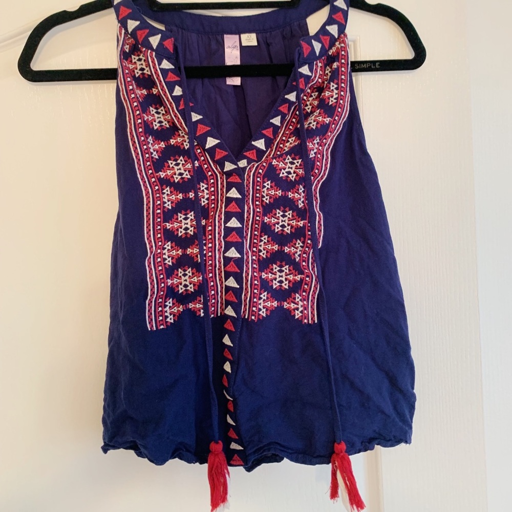Royal blue shirt with pink and white detailing